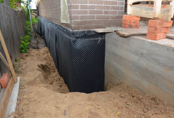 Happy homeowners after waterproofing job in Perrysburg